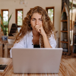 Person looking at laptop