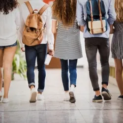 Behind image of young students