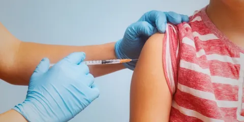 Child receiving vaccine