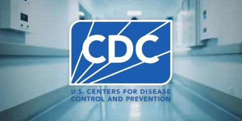 Hospital hallway with CDC logo