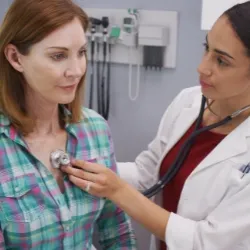 Mature woman with doctor